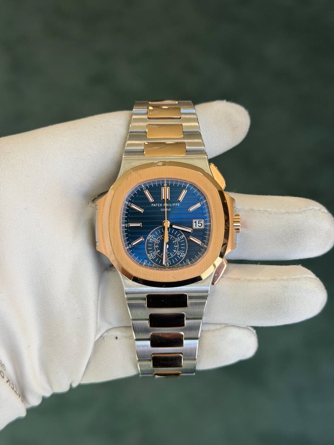 May be an image of wrist watch and text