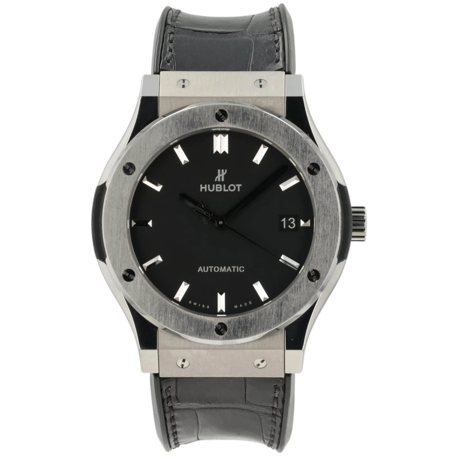 May be an image of wrist watch and text that says '٣ HUBLOT 13 M AUTOMATIC'
