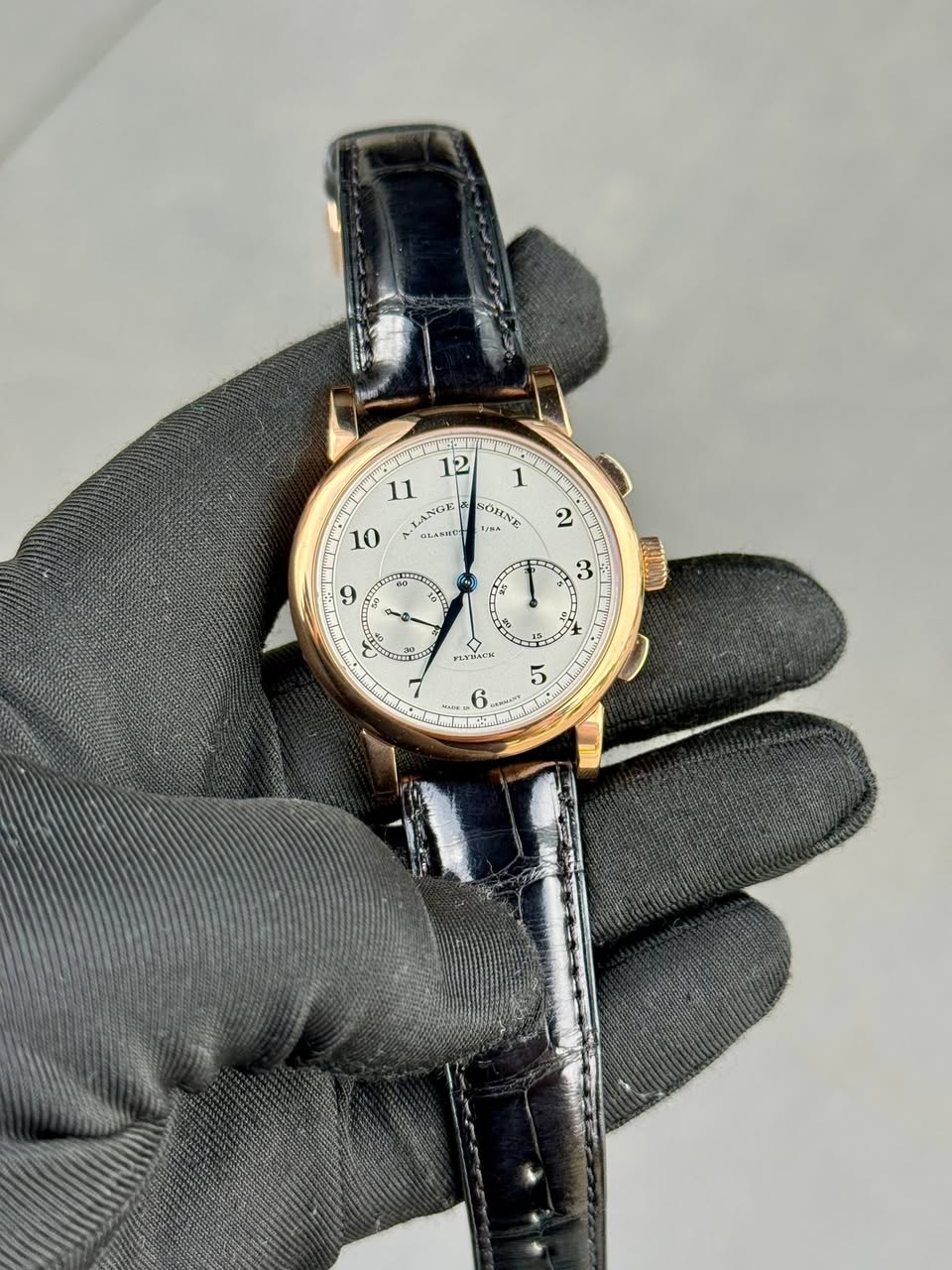 May be an image of wrist watch and text