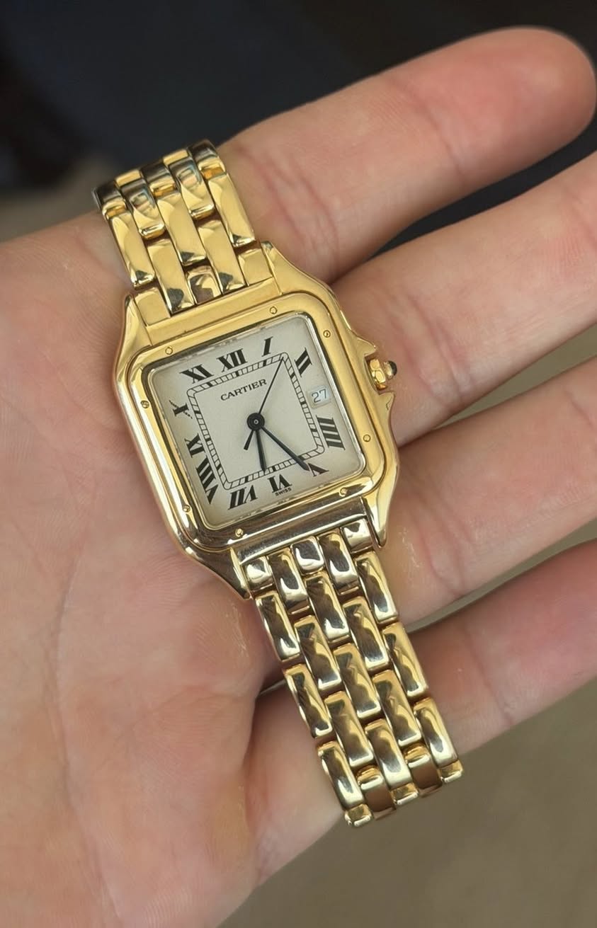 May be an image of digital watch and text