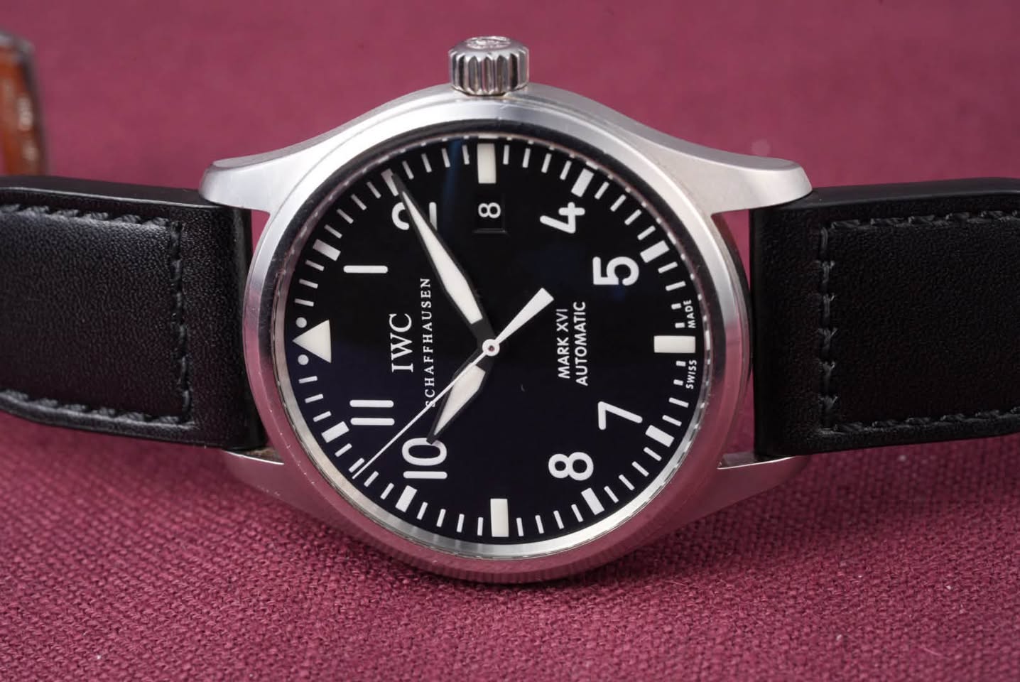 May be an image of wrist watch and text