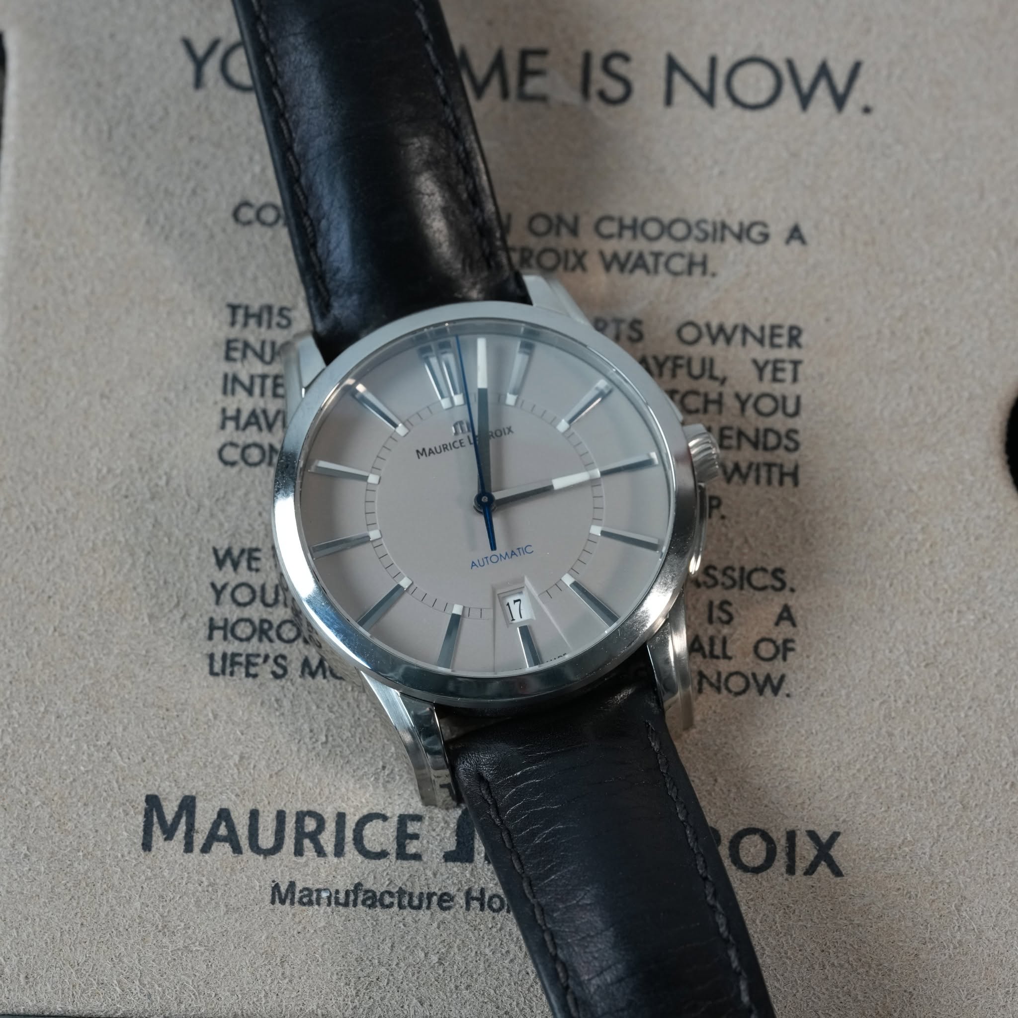 May be an image of wrist watch and text that says 'NOW. CHOOSING WATCH. THIS ENU INTE HAЙ CO T MAURICE OWNER YET OU AUTOMATC 1C AUTOM WE YOU HORO LIFE'SN W MAURICE Manufacture…