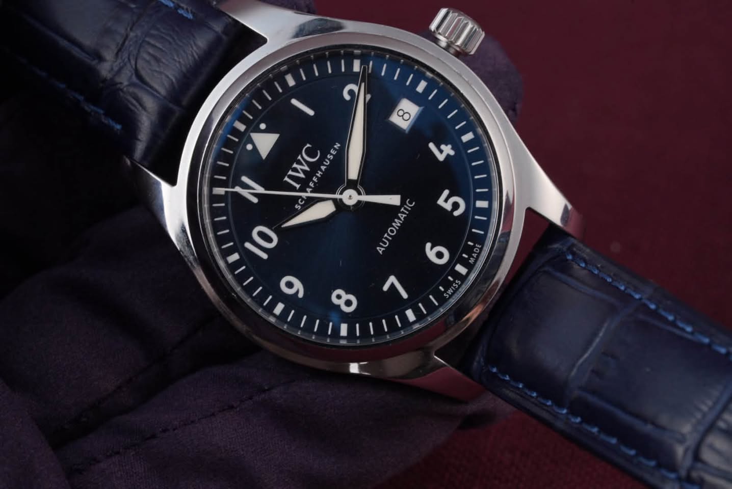 May be an image of wrist watch and text