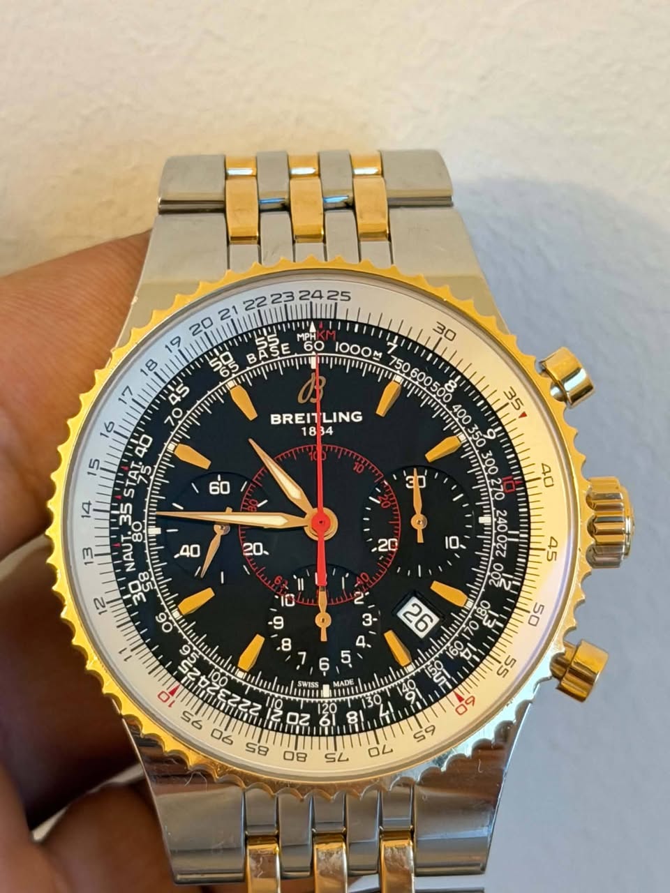May be an image of wrist watch and text that says ' ል 60 60 1000M 30 5 מוייןייןסייים B 華口口 BREITLING LING STAS 14 5 NAUT35 OÜD ỘE 09 50 II 0េ SWISS MADE 26 mu O es 58 ው Z 55 80…
