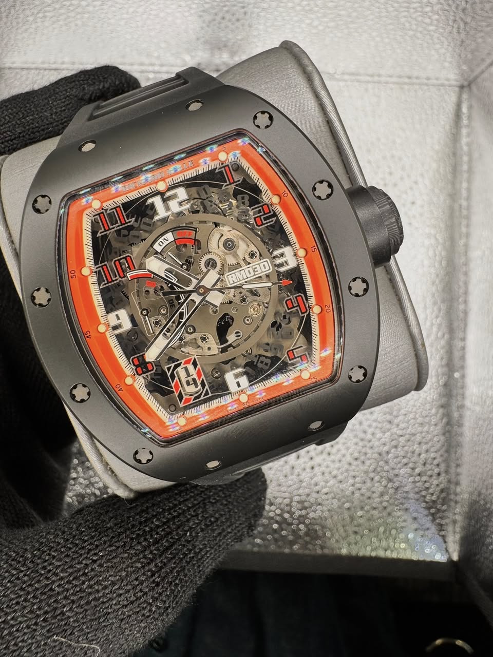 May be an image of wrist watch and text