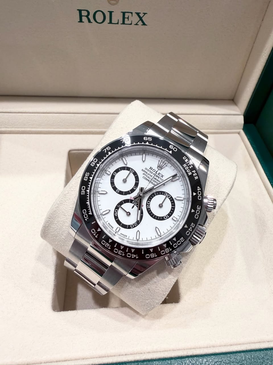 May be an image of wrist watch and text