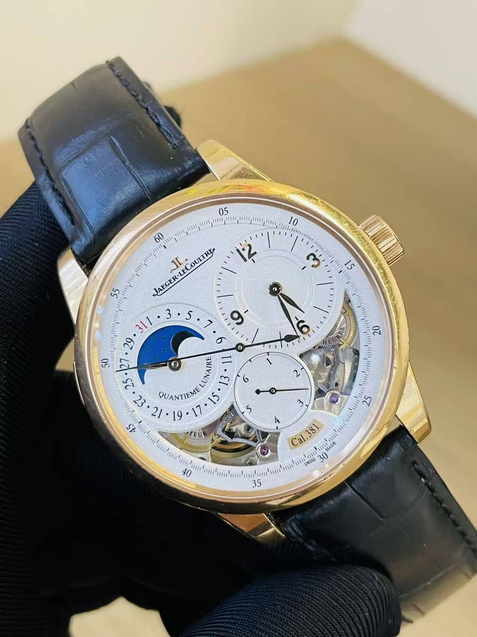 May be an image of wrist watch and text