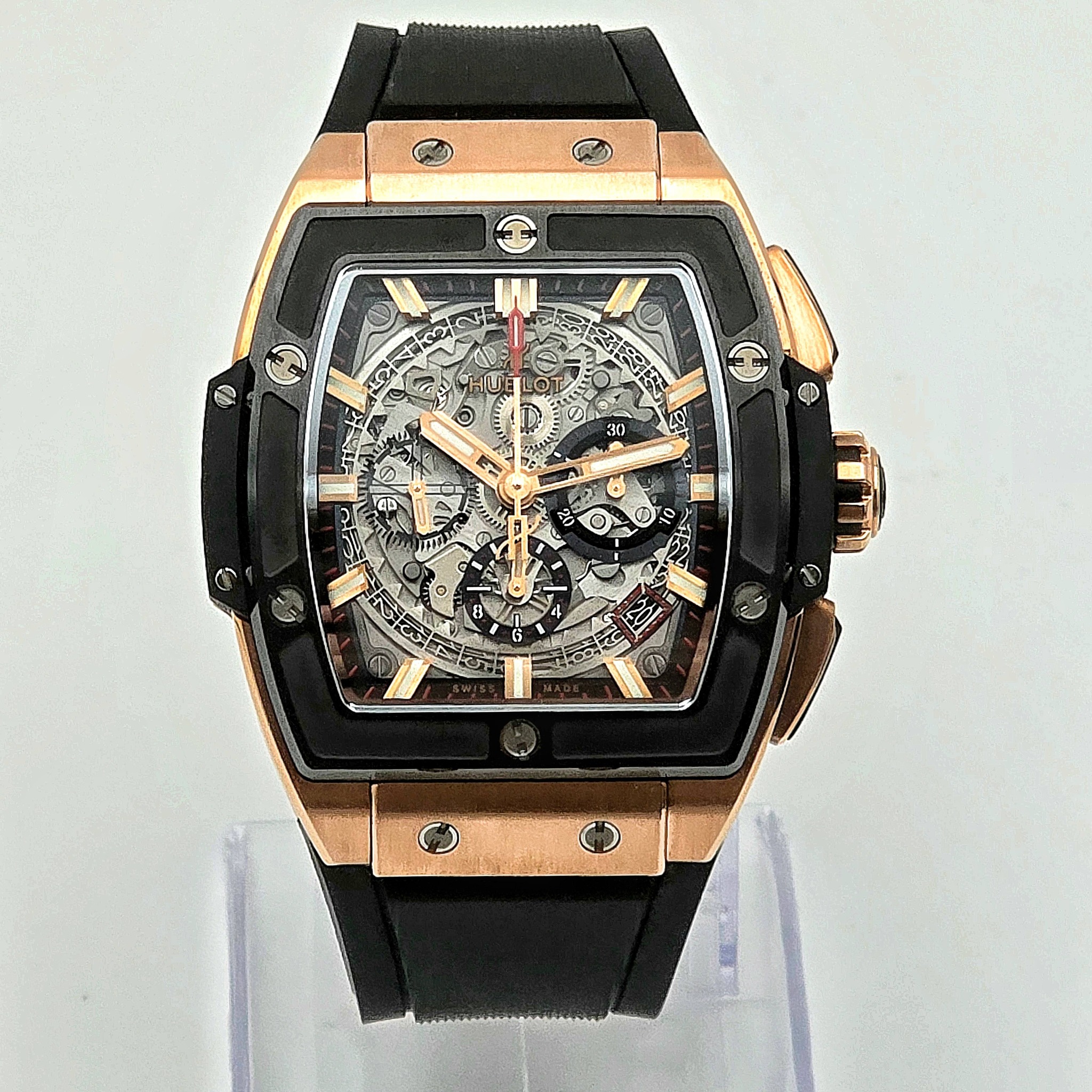 May be an image of wrist watch and text