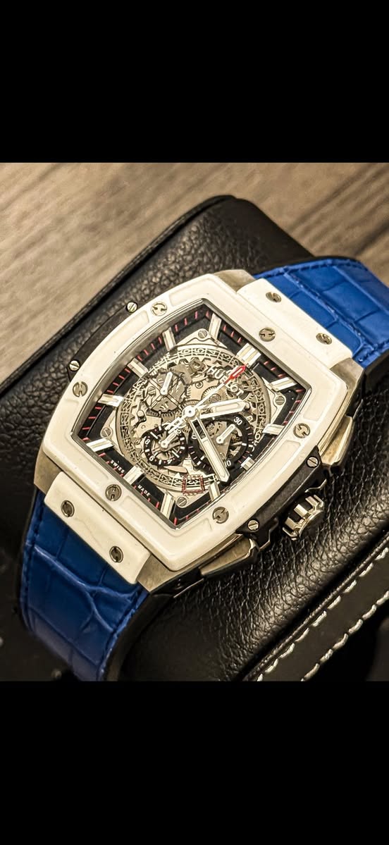 May be an image of wrist watch and text