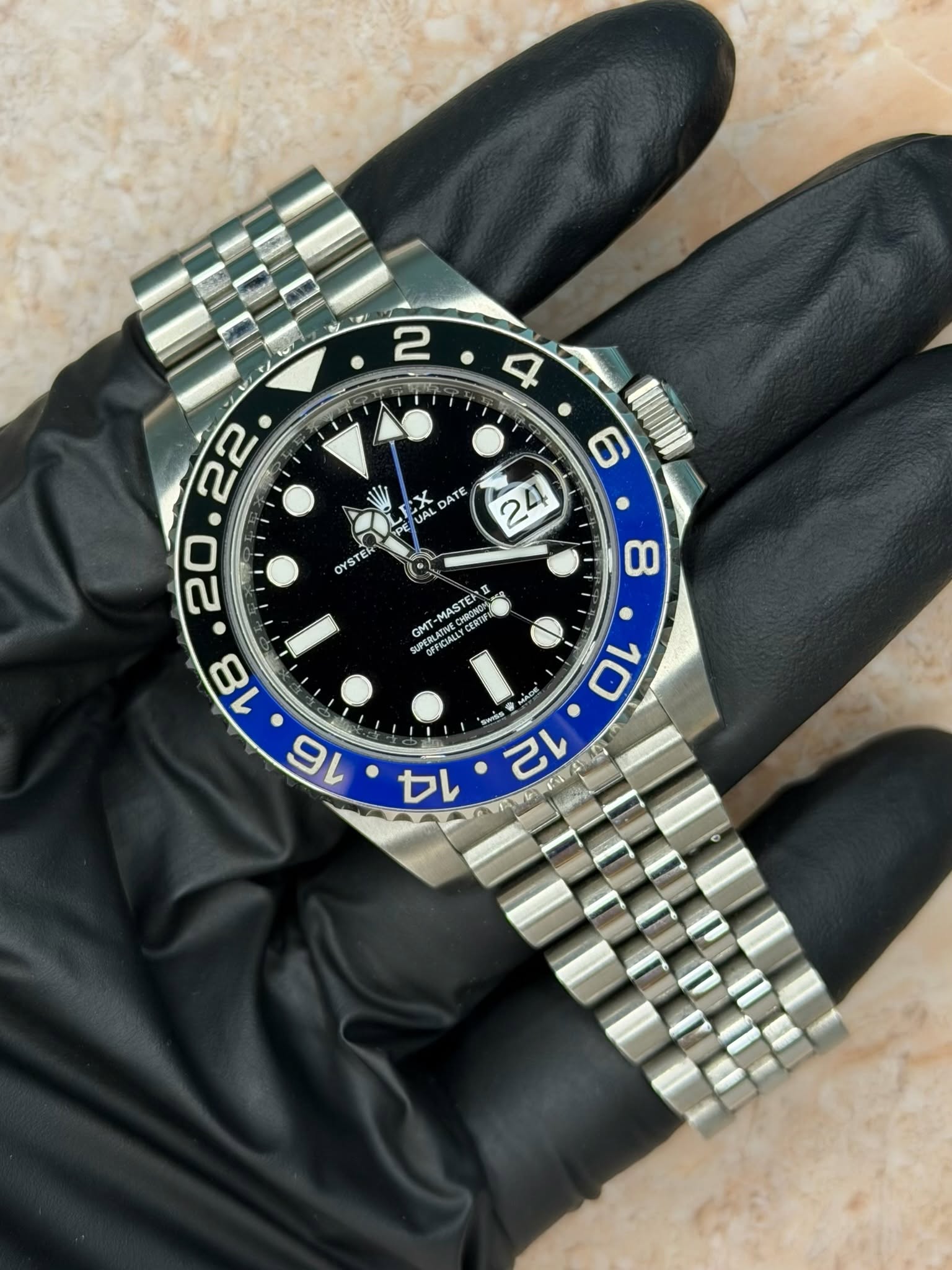 May be an image of wrist watch and text