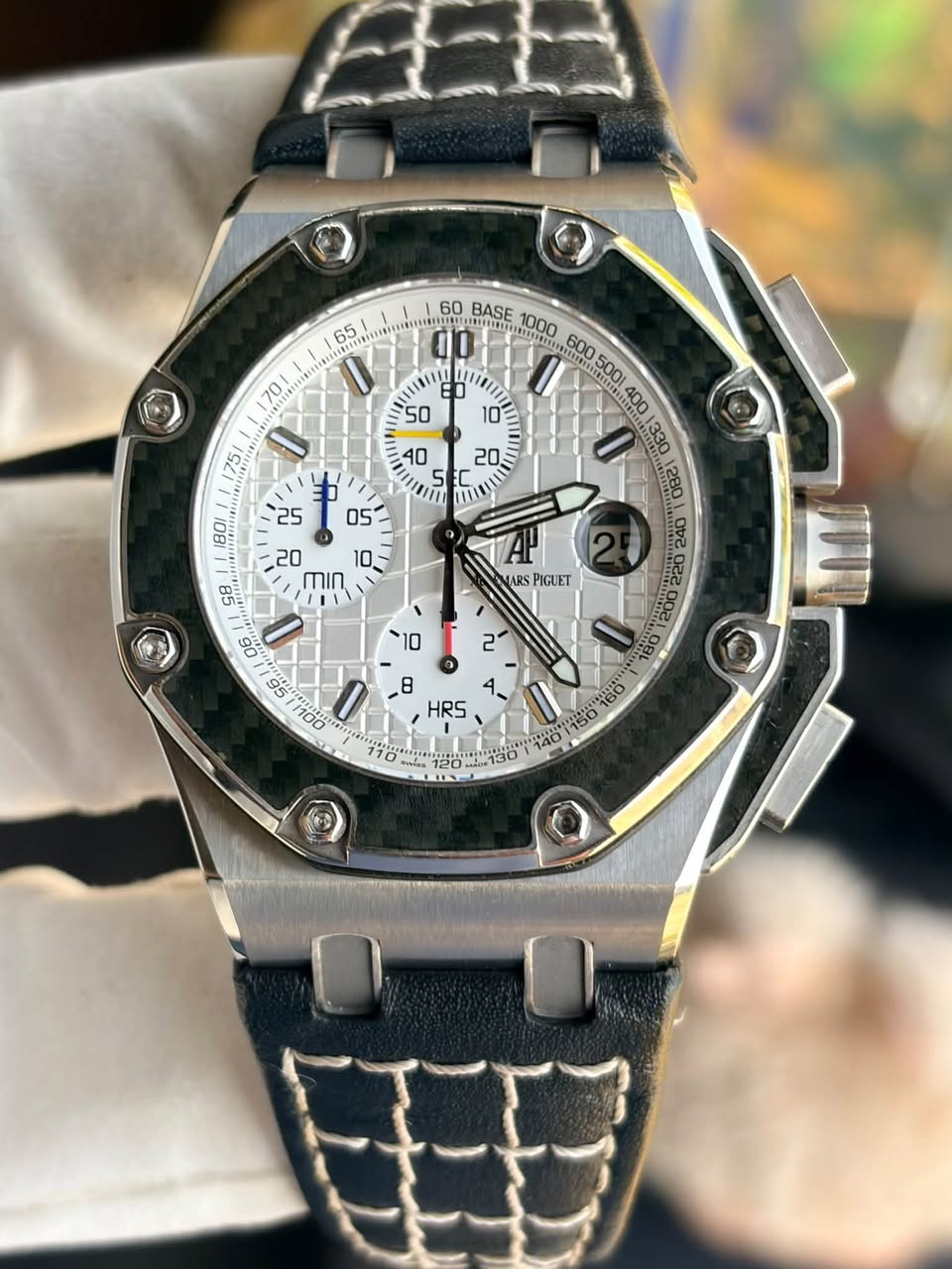 May be an image of wrist watch and text