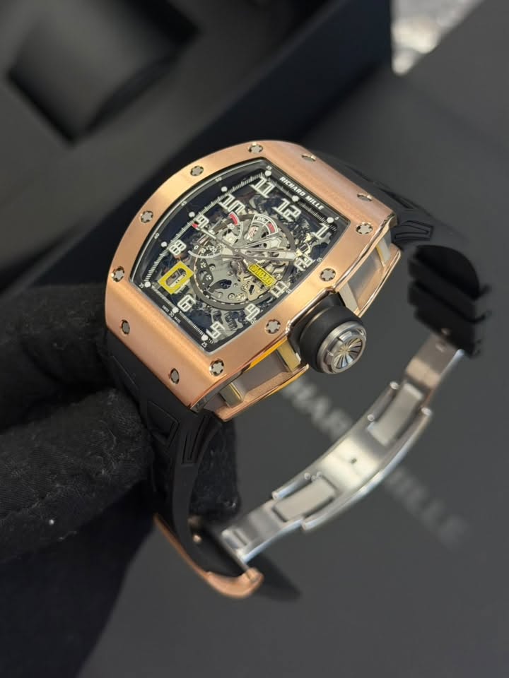 May be an image of wrist watch and text that says '11 2 RICHARD ብጦ 12 MILLE โธ ሃ'