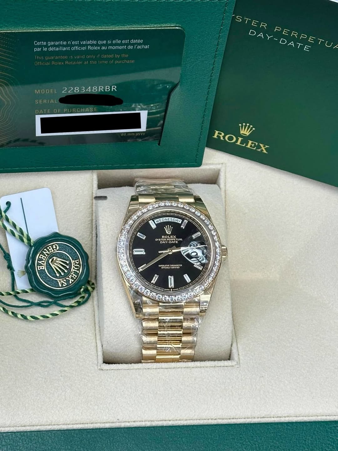 May be an image of wrist watch and text