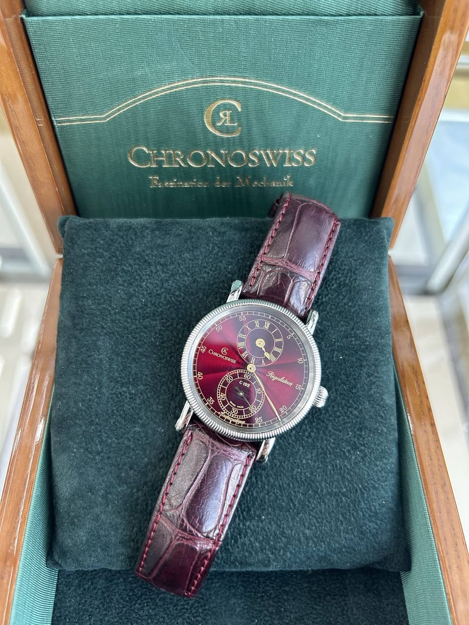 May be an image of wrist watch and text
