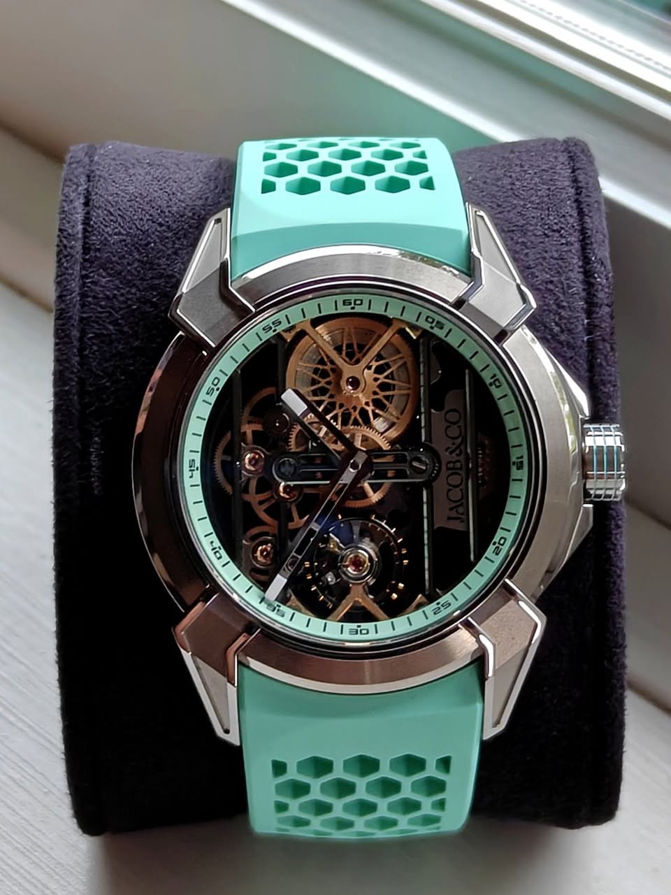May be an image of wrist watch and text