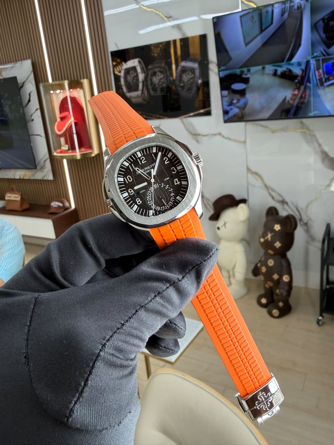 May be an image of wrist watch and text