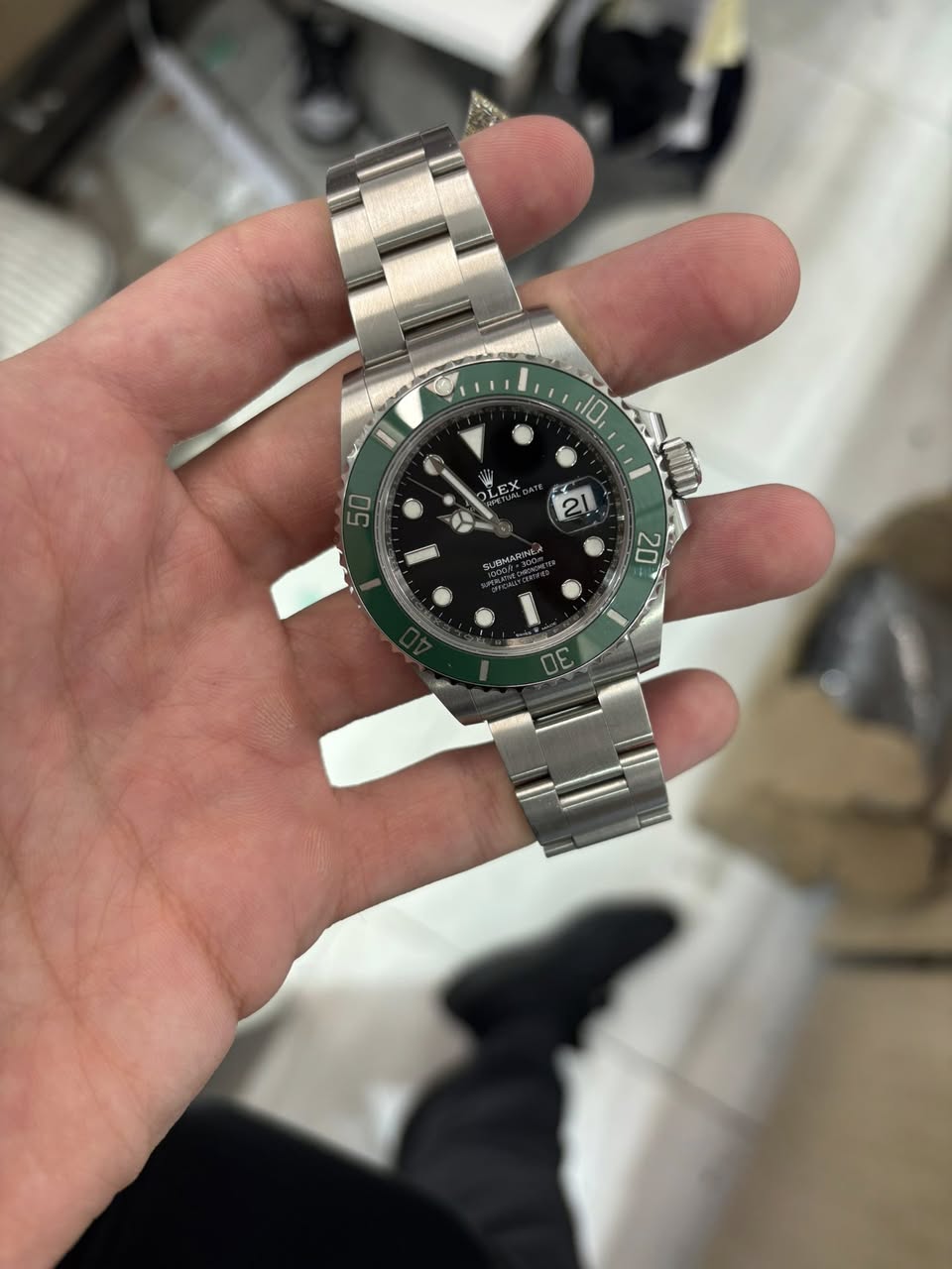 May be an image of wrist watch and text