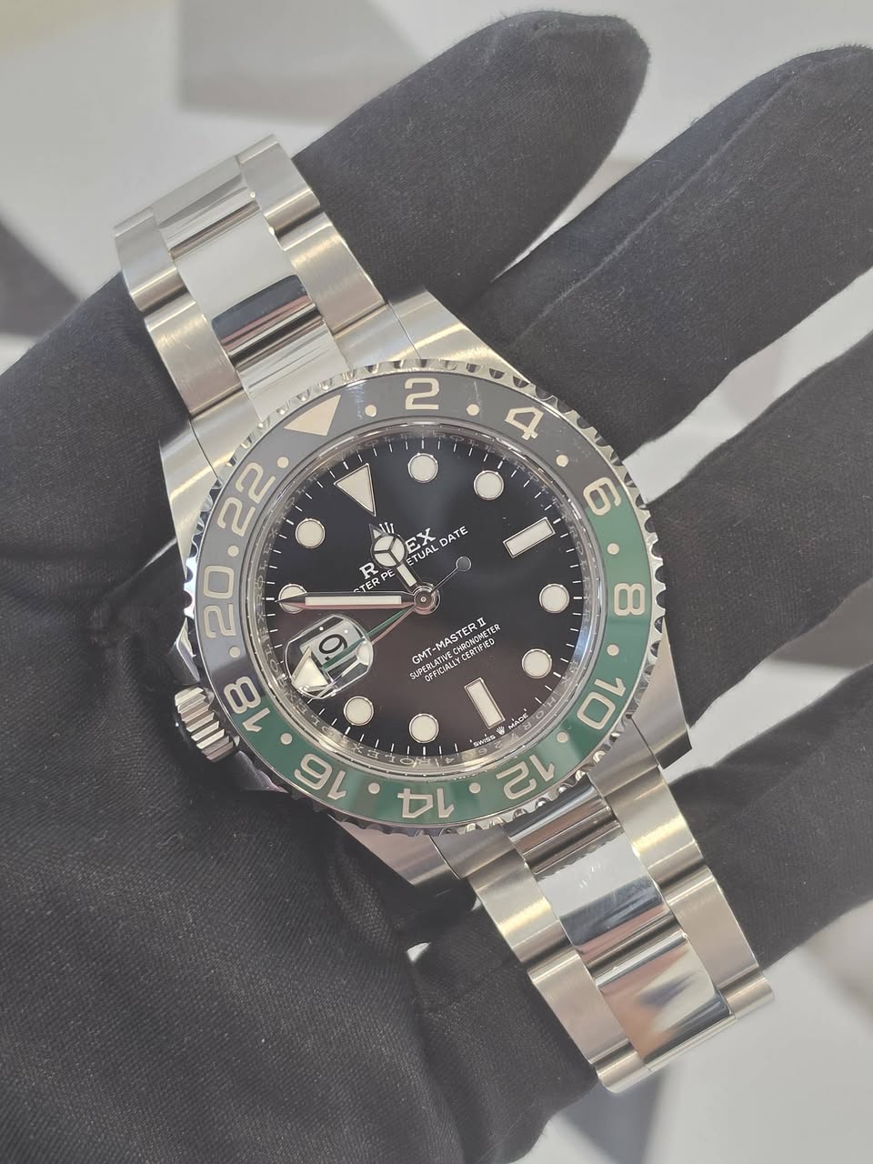 May be an image of wrist watch and text