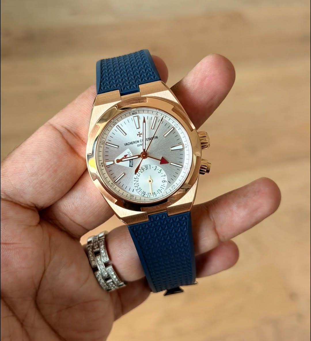 May be an image of wrist watch and text