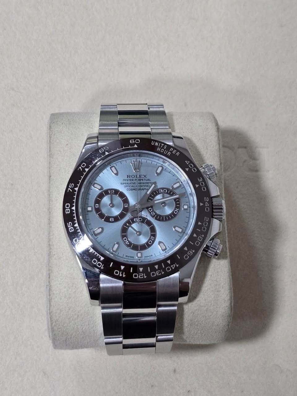 May be an image of wrist watch and text