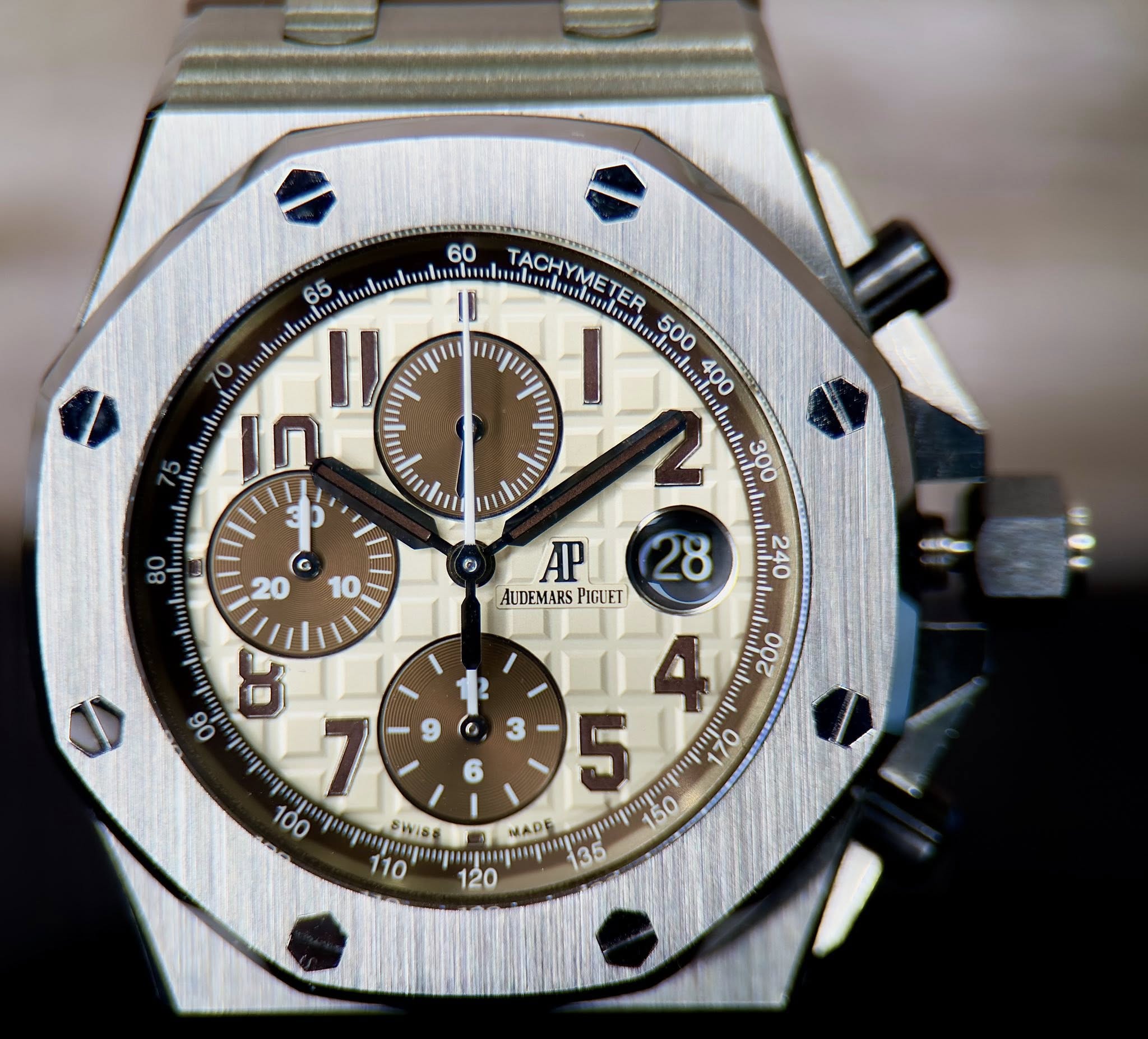 May be an image of wrist watch and text