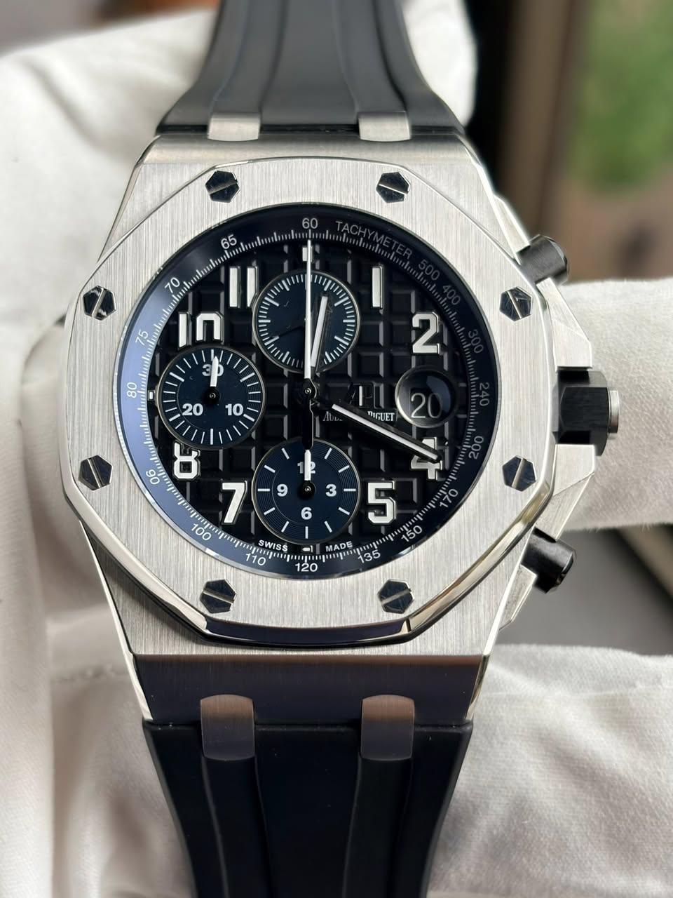 May be an image of wrist watch and text