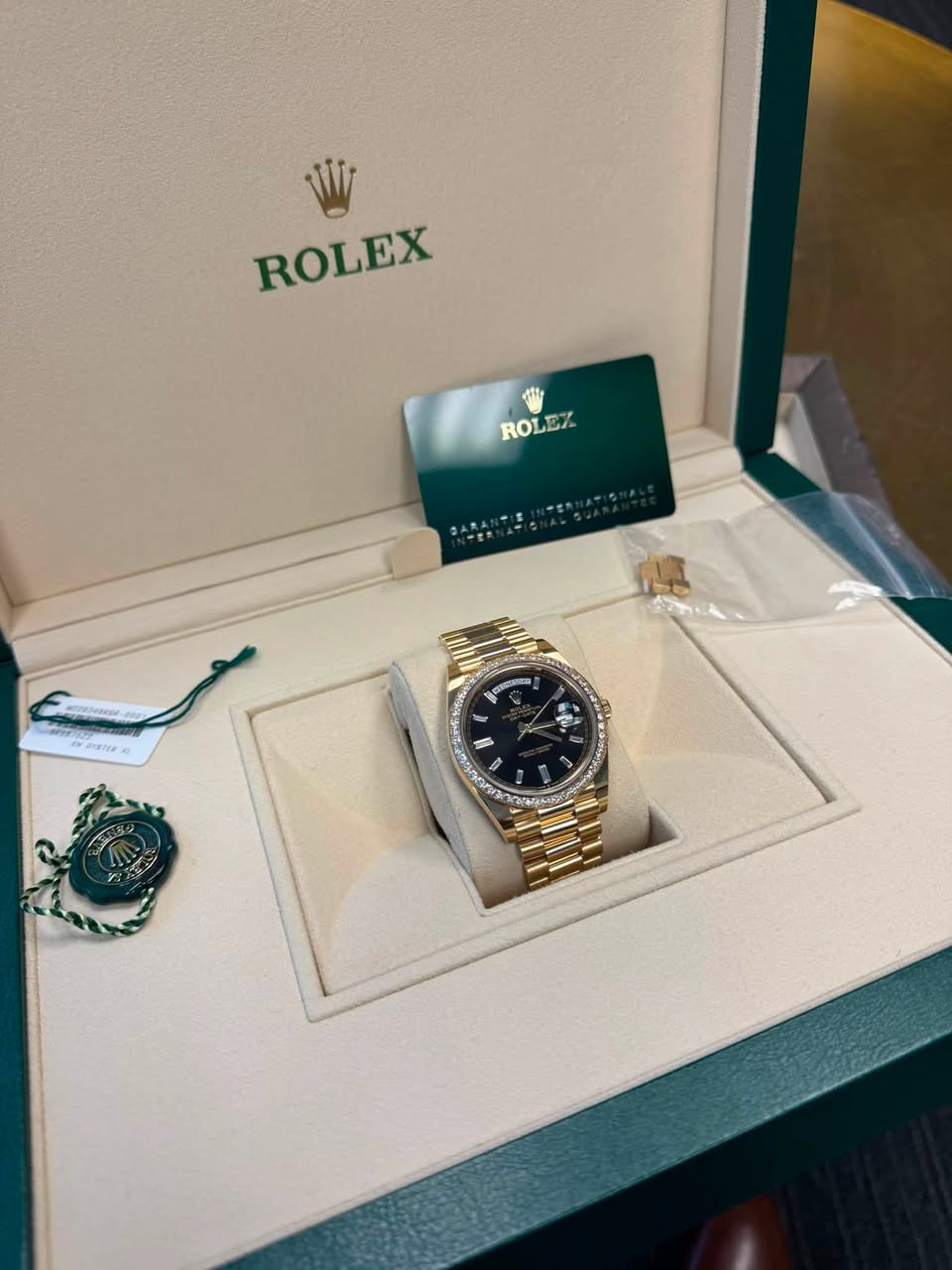 May be an image of wrist watch and text