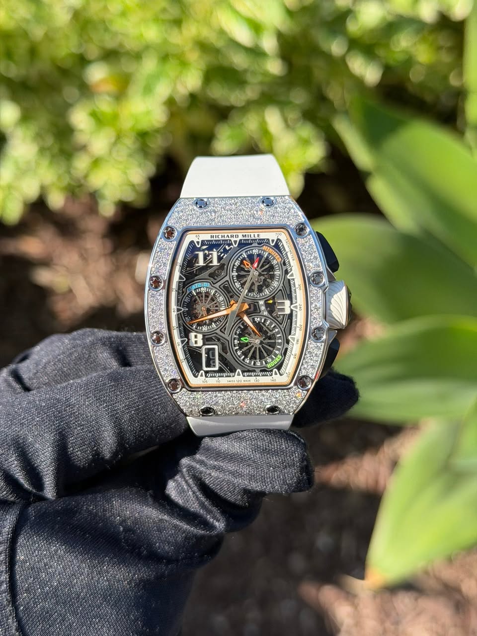 May be an image of wrist watch and text