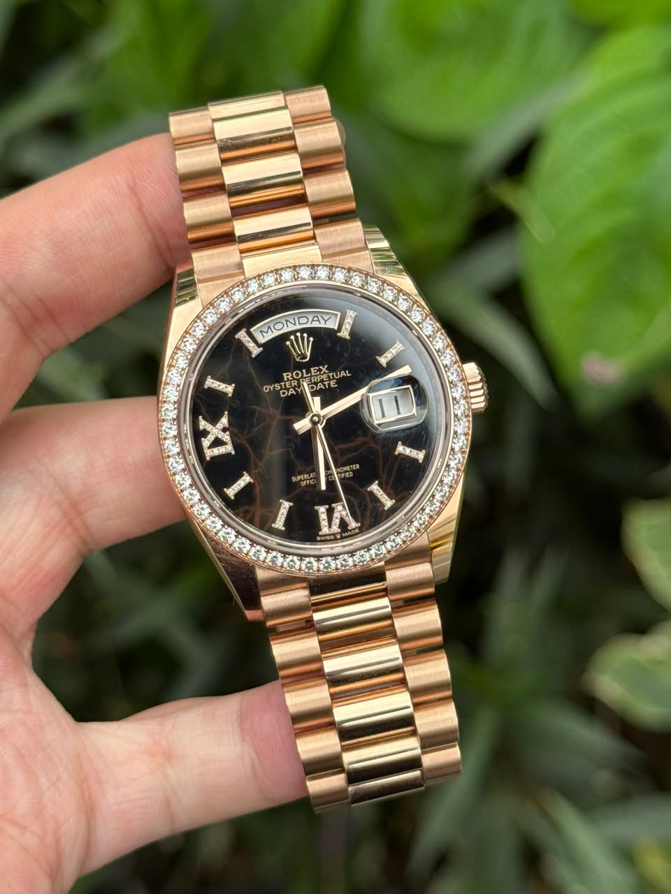 May be an image of wrist watch and text