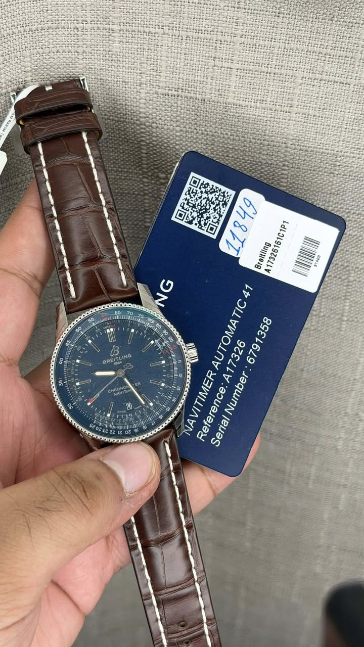 May be an image of wrist watch and text that says '口民定口 口記教き 11849 49 Breltling A1732616 17326161C1P 61C1P1 BT424 HIN NG N BR BREI TIC f A17326 NAVITIMER NA Reference: Refere…