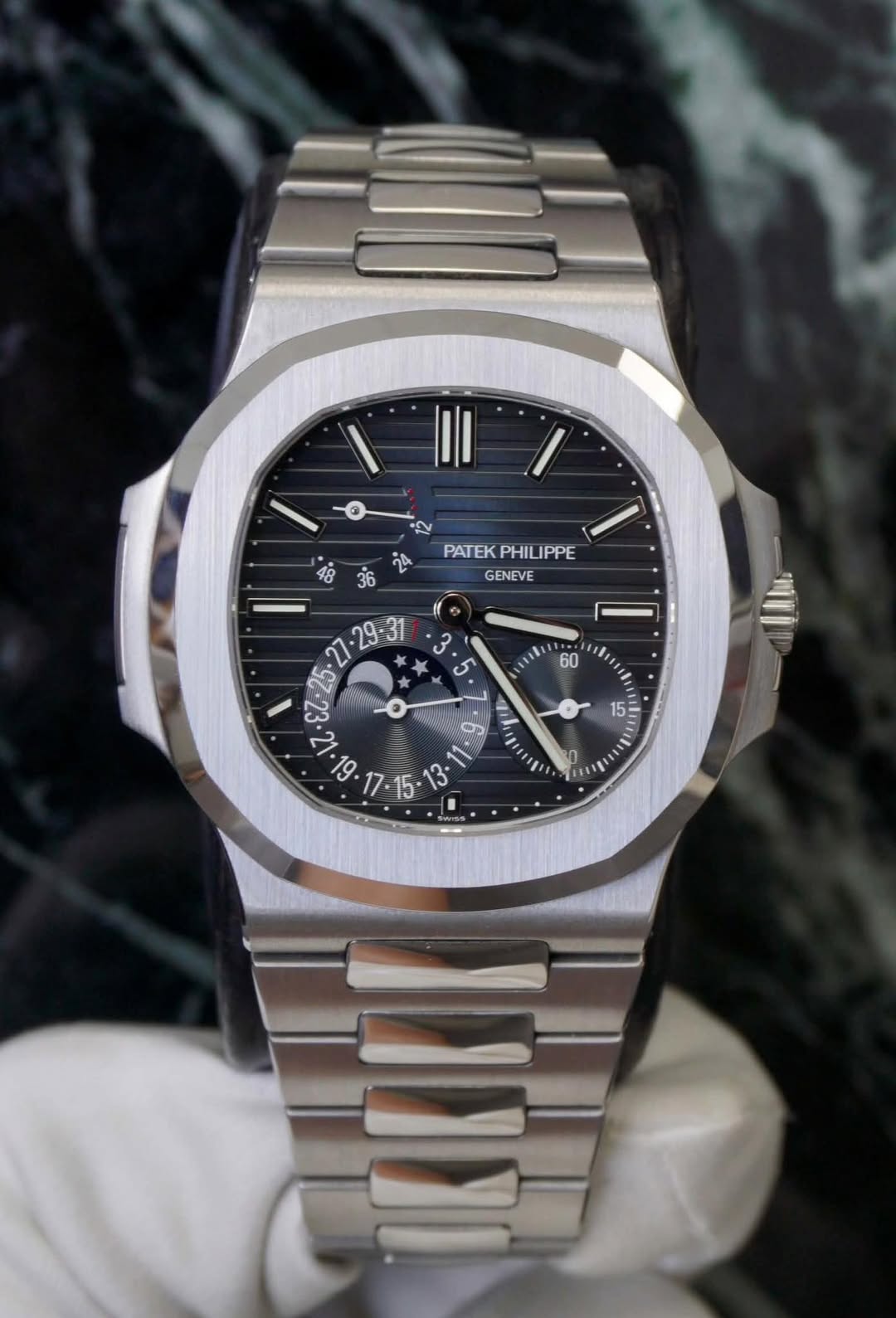 May be an image of wrist watch and text that says 'α PATEKPHILIPPE PATEK PHILIPPE 36 GENEVE $7. ခ 29-31 3° 5 mlu 60 I 15 0 30'