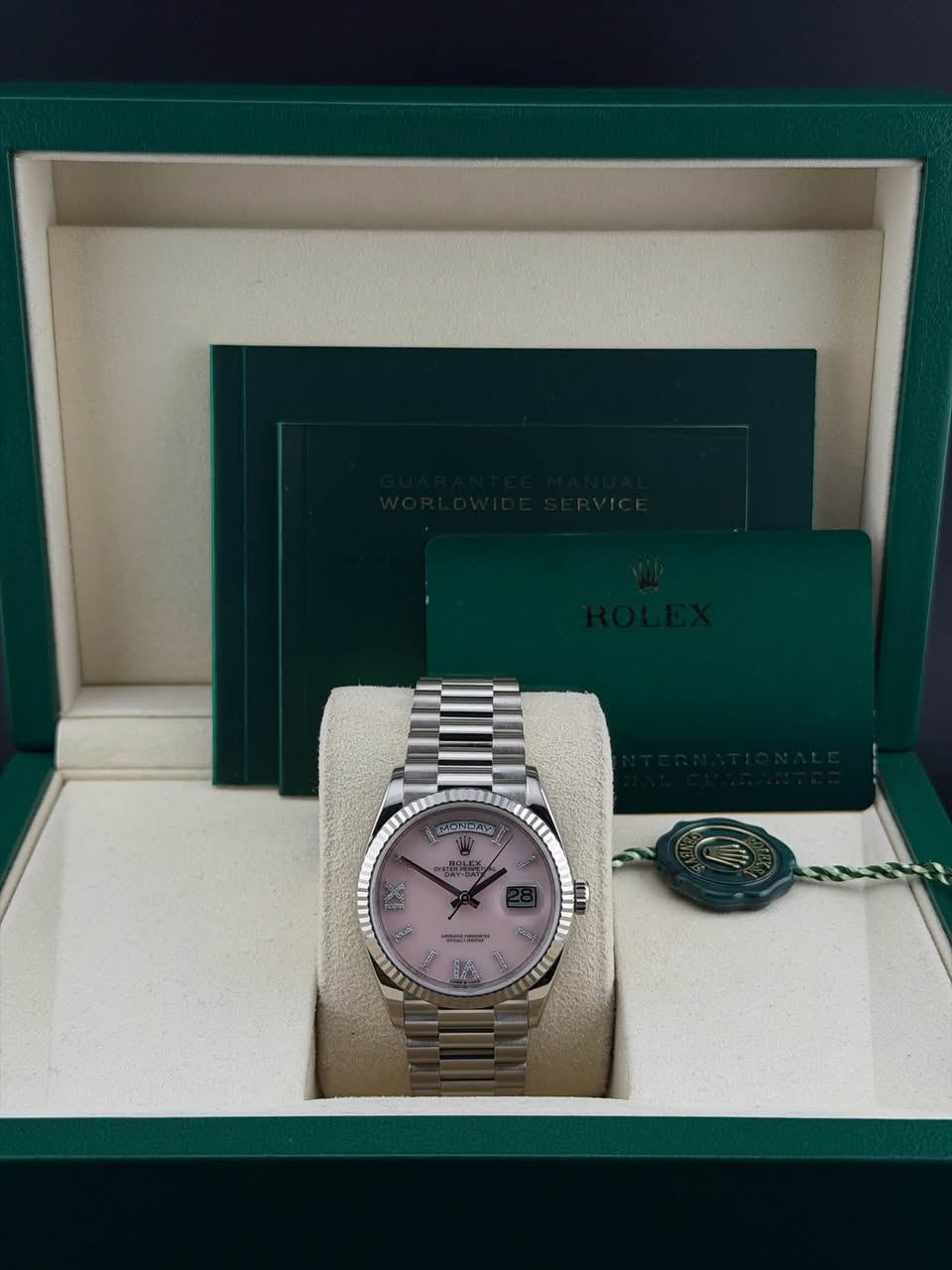 May be an image of wrist watch and text