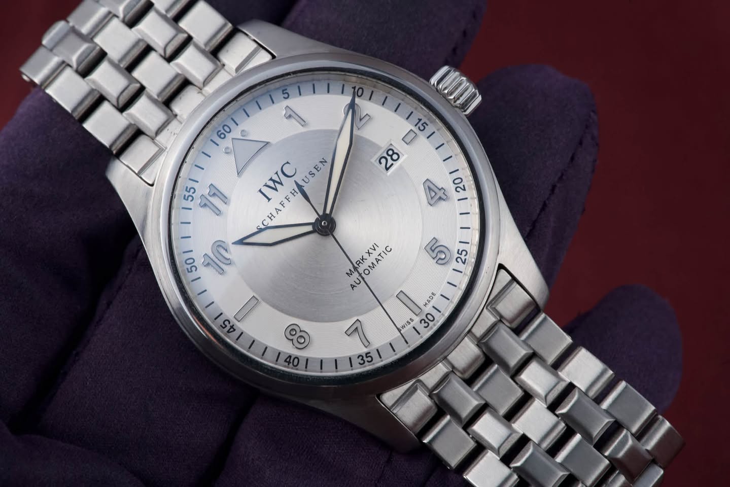 May be an image of wrist watch and text