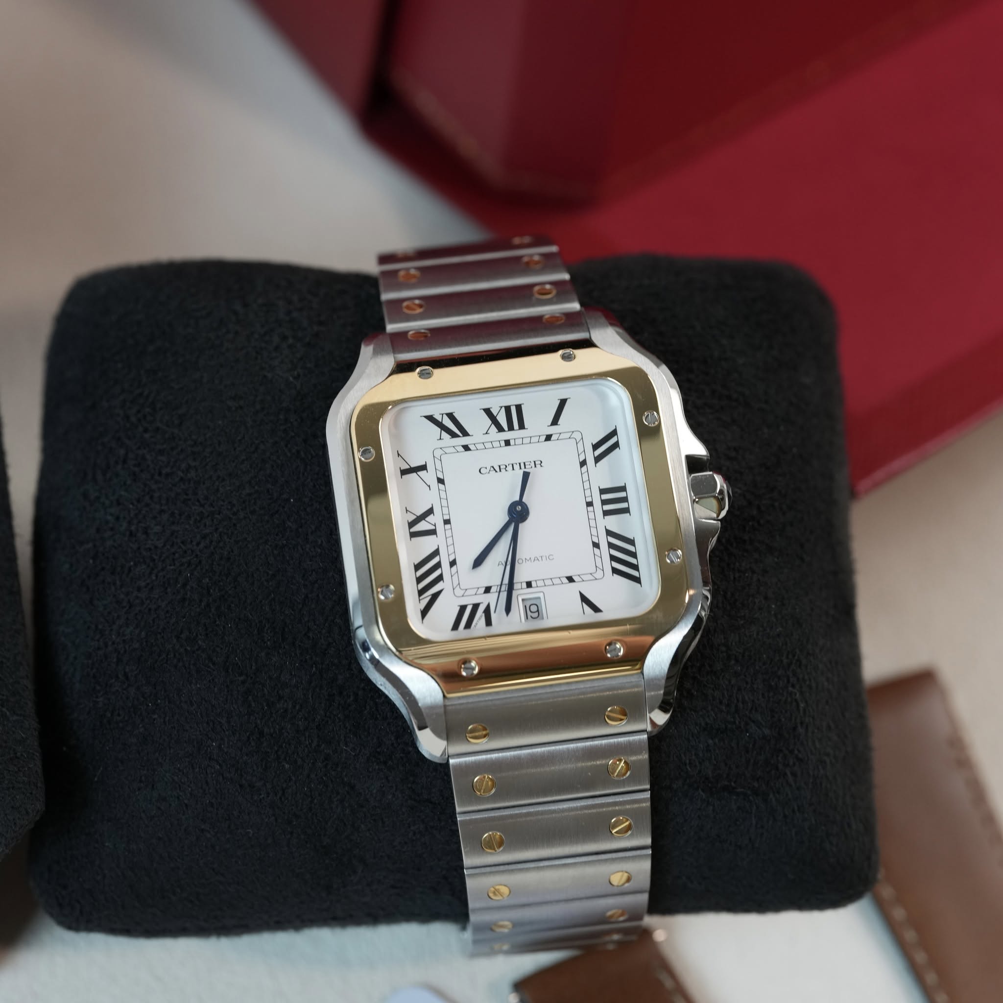 May be an image of wrist watch and text