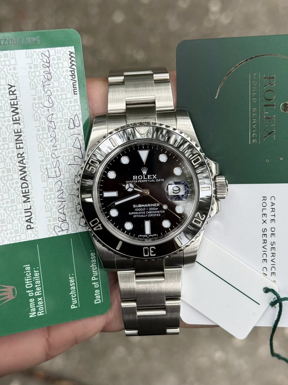 May be an image of wrist watch and text