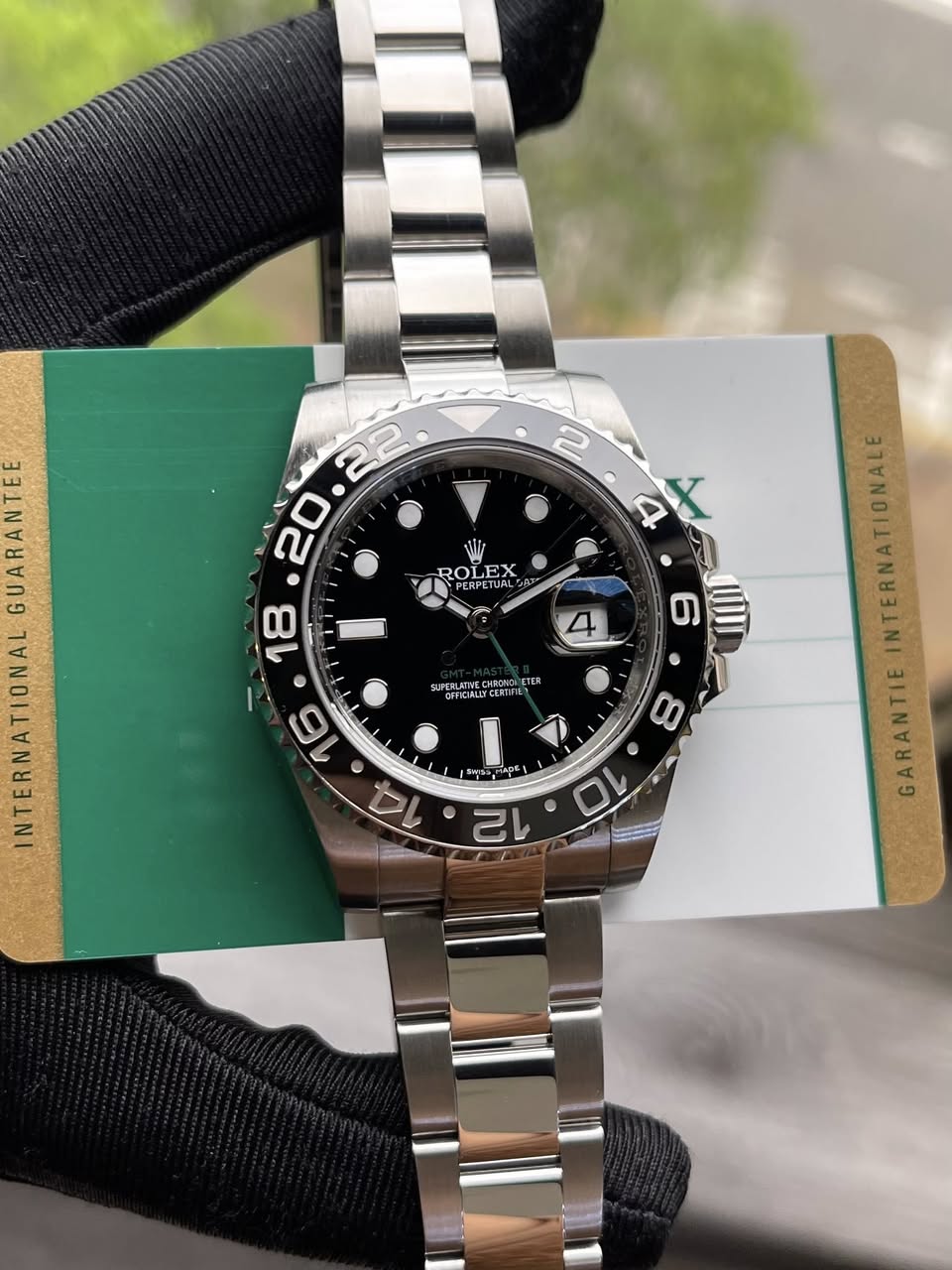 May be an image of wrist watch and text that says ' ROLEX 6 SUPERLATIVE BANNE ស AA TER GARANTIE'