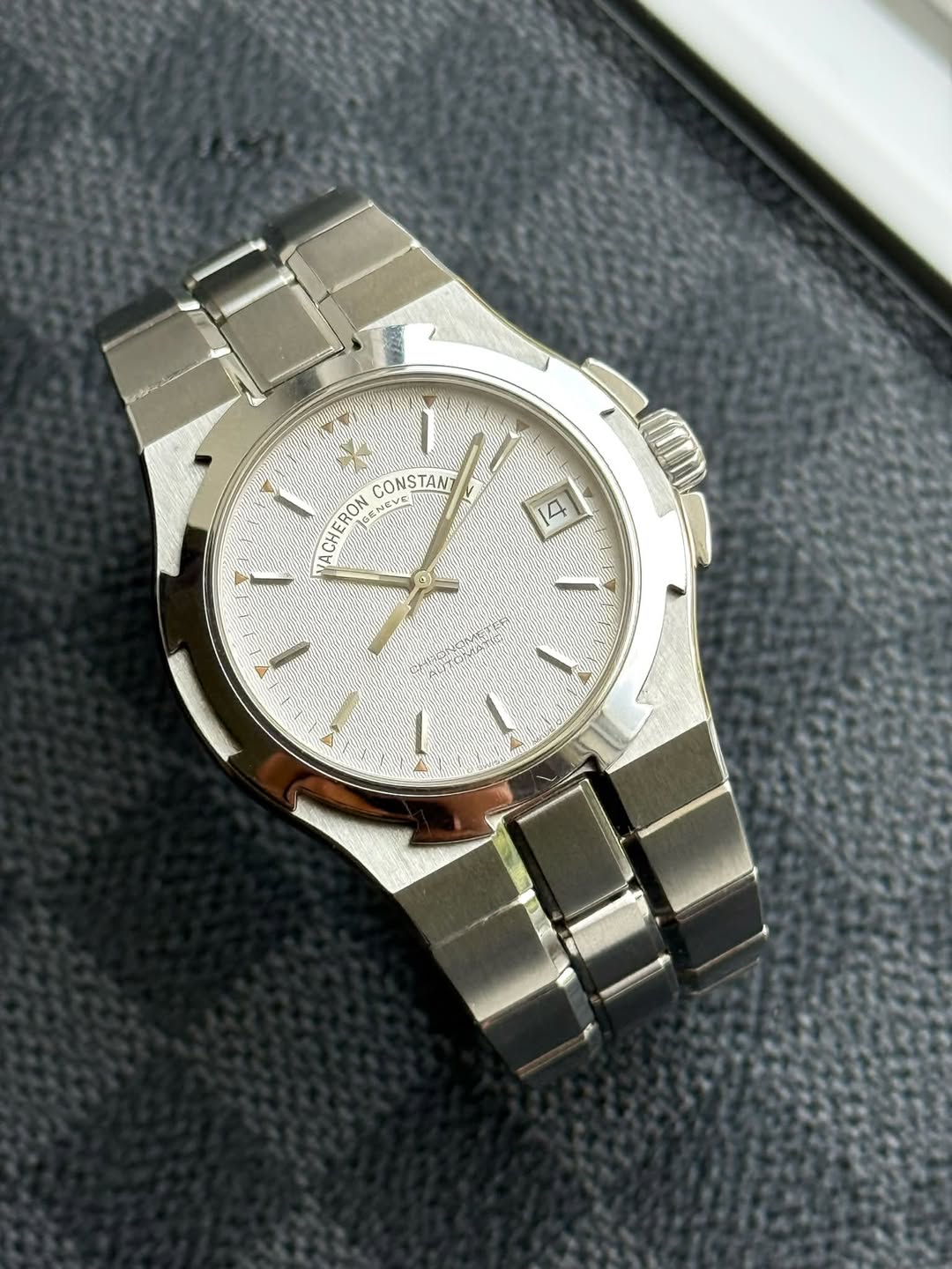 May be an image of wrist watch and text