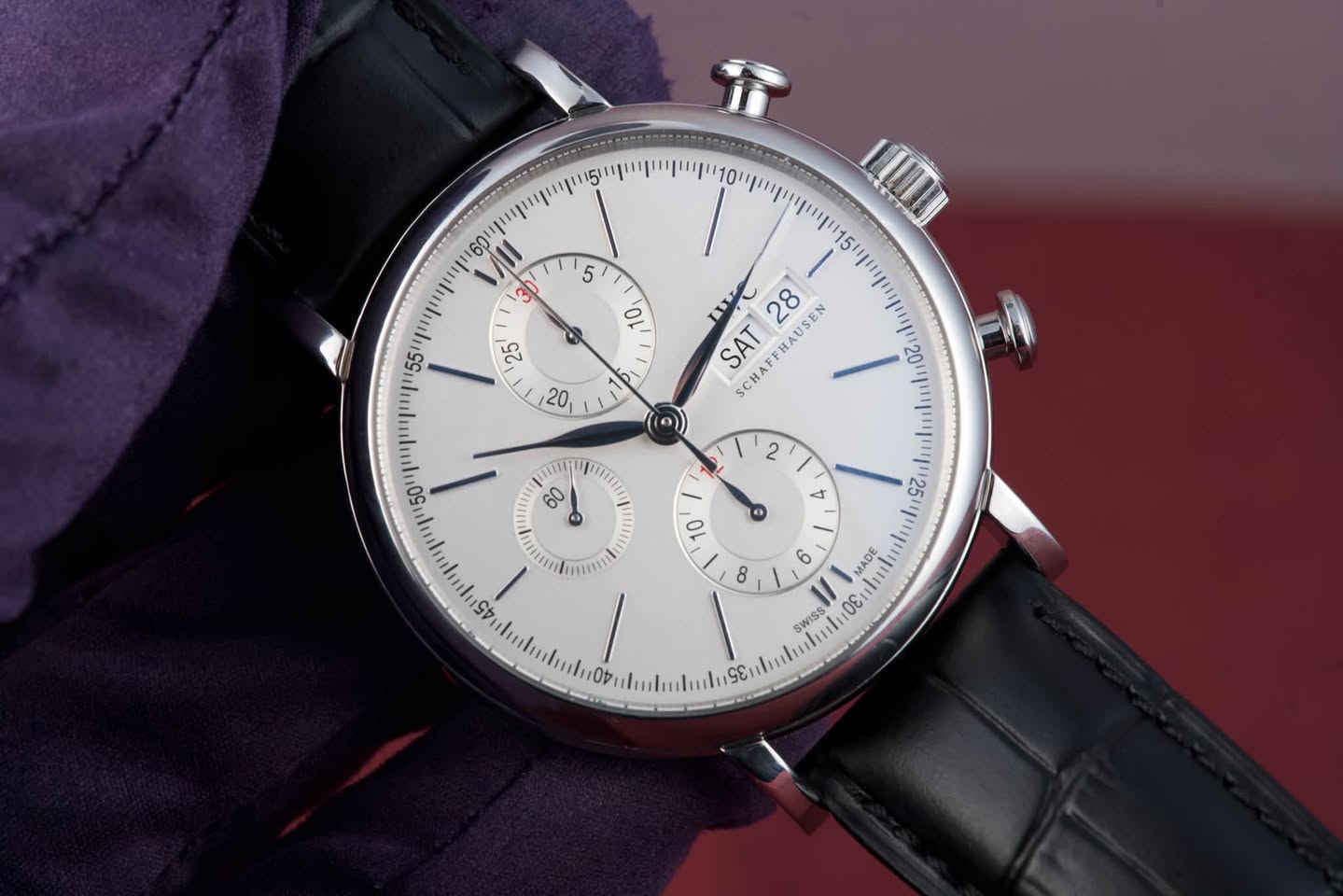 May be an image of wrist watch and text