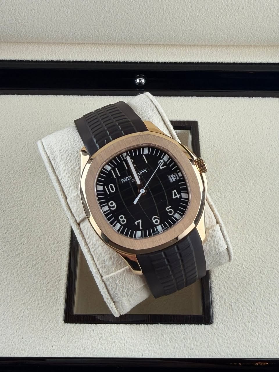 May be an image of wrist watch and text