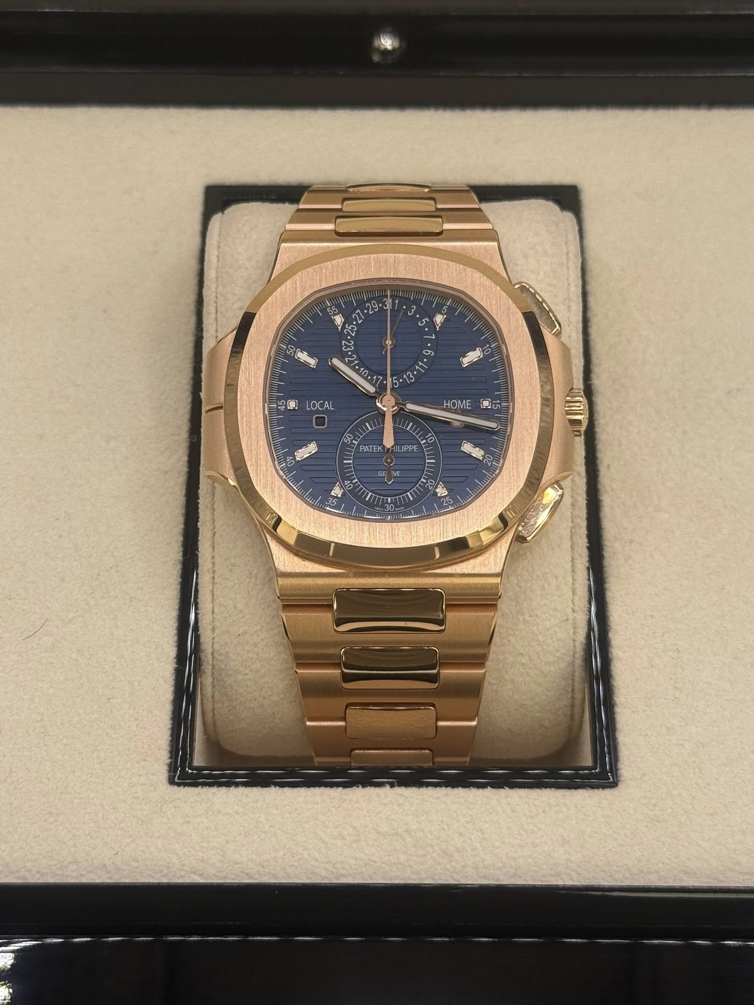 May be an image of wrist watch and text that says 'ศร 2 2 Hung 50 OCAL HOME ان PATEK PPE'