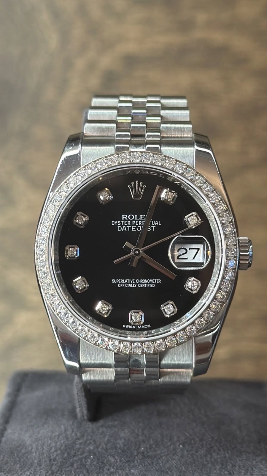 May be an image of wrist watch and text