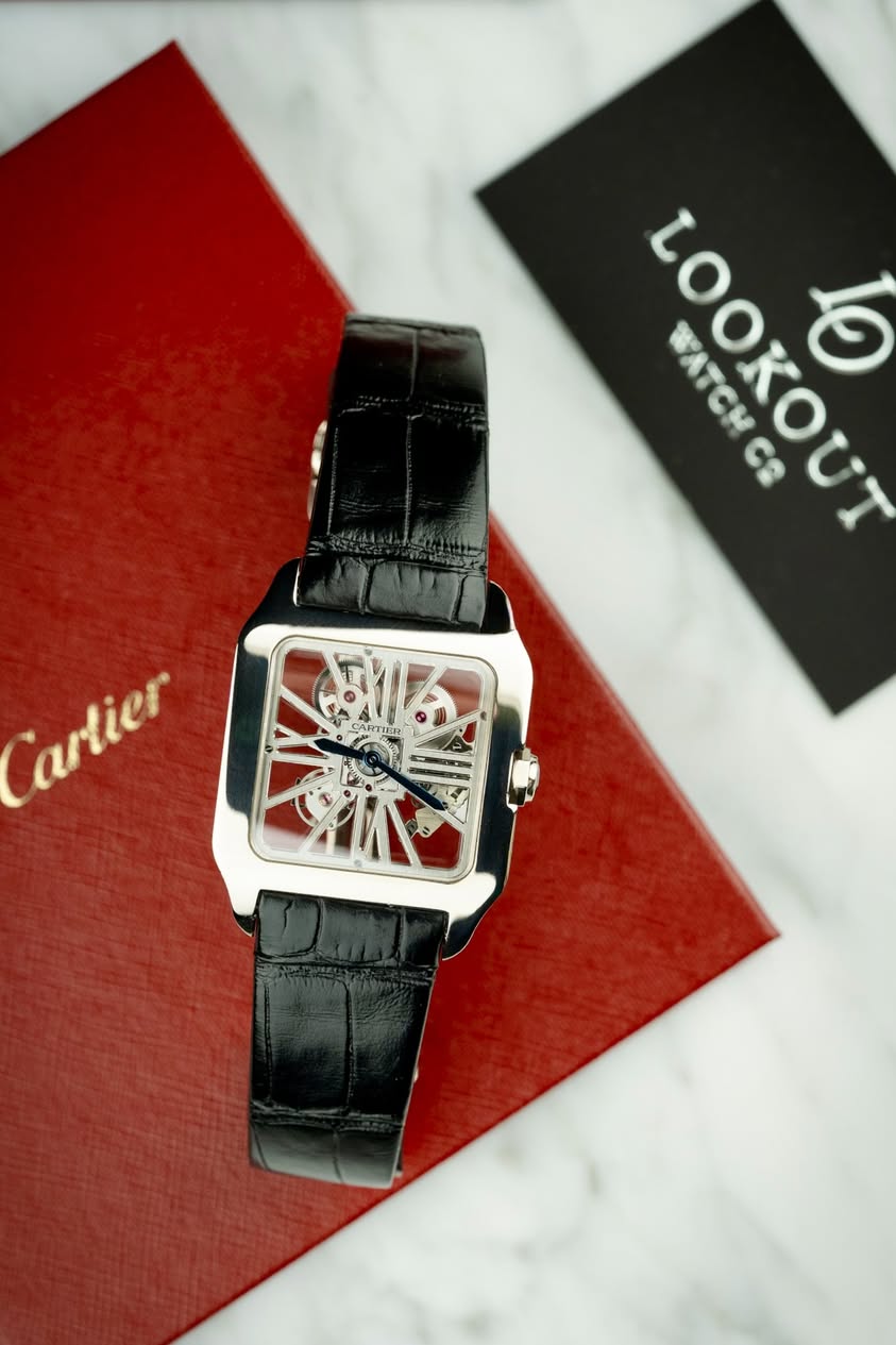 May be an image of wrist watch and text that says 'LOOKOUT гООКουТ КАТС o ТАТСМ CB Cartier'