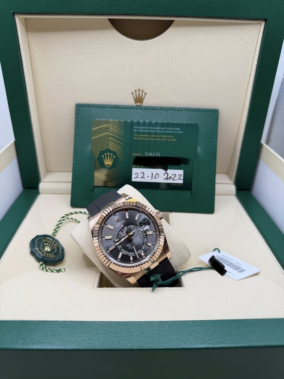 May be an image of wrist watch and text