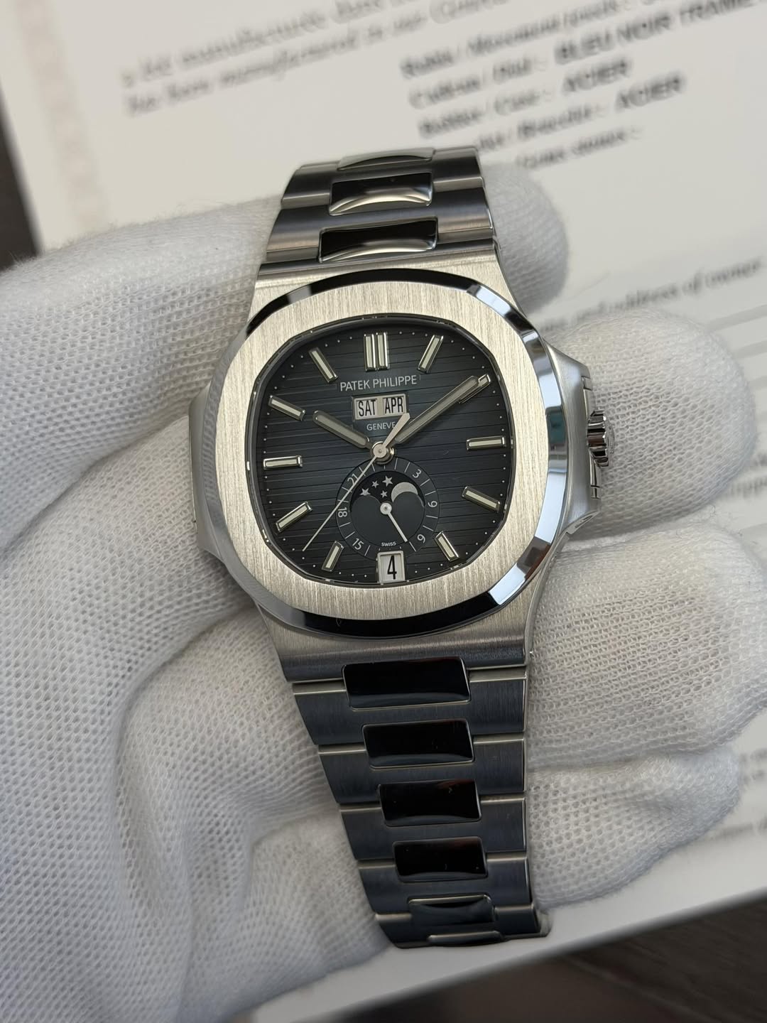 May be an image of wrist watch and text