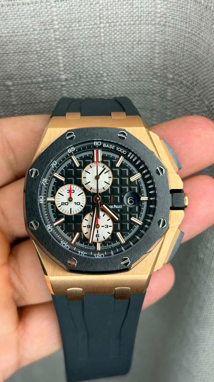 May be an image of wrist watch and text