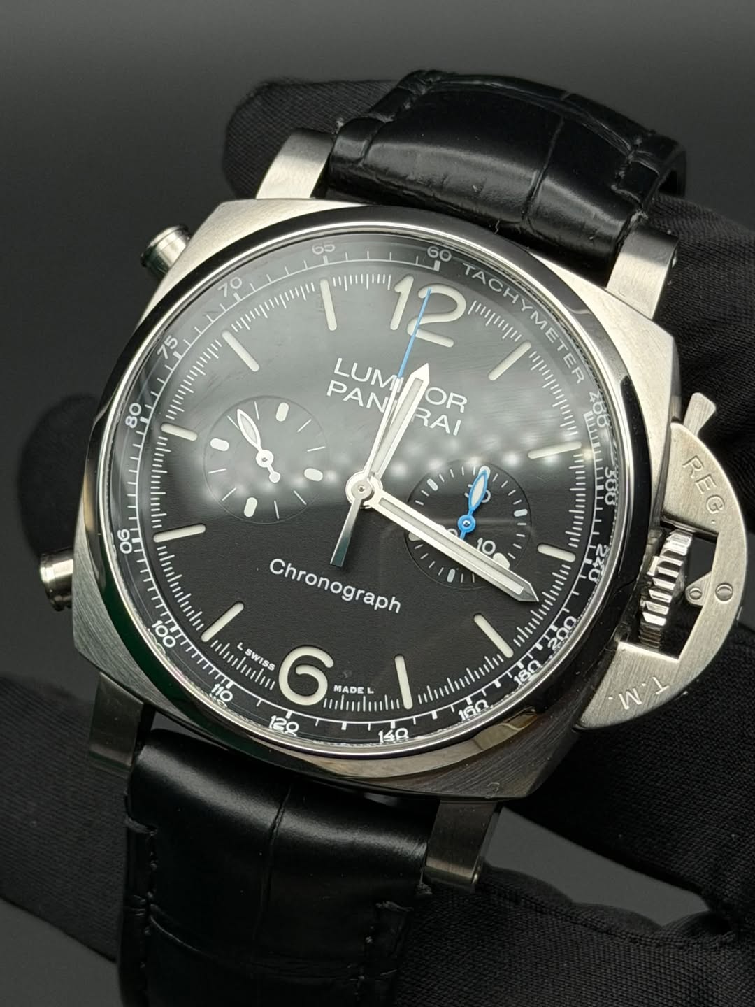 May be an image of wrist watch and text