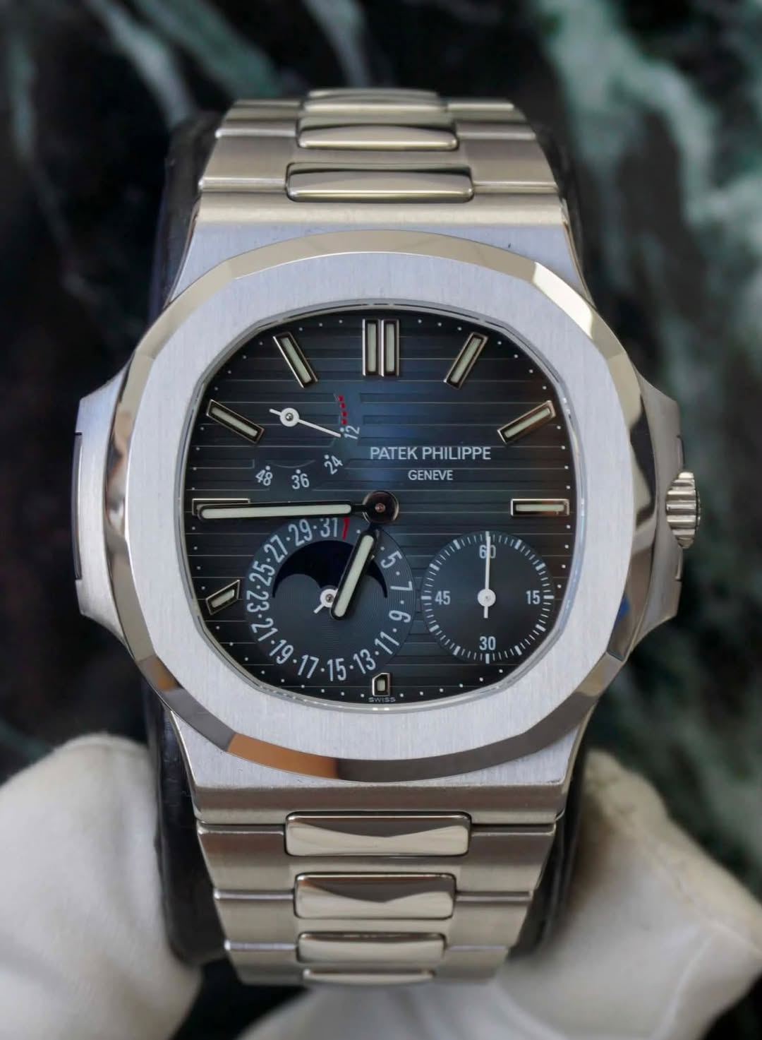 May be an image of wrist watch and text