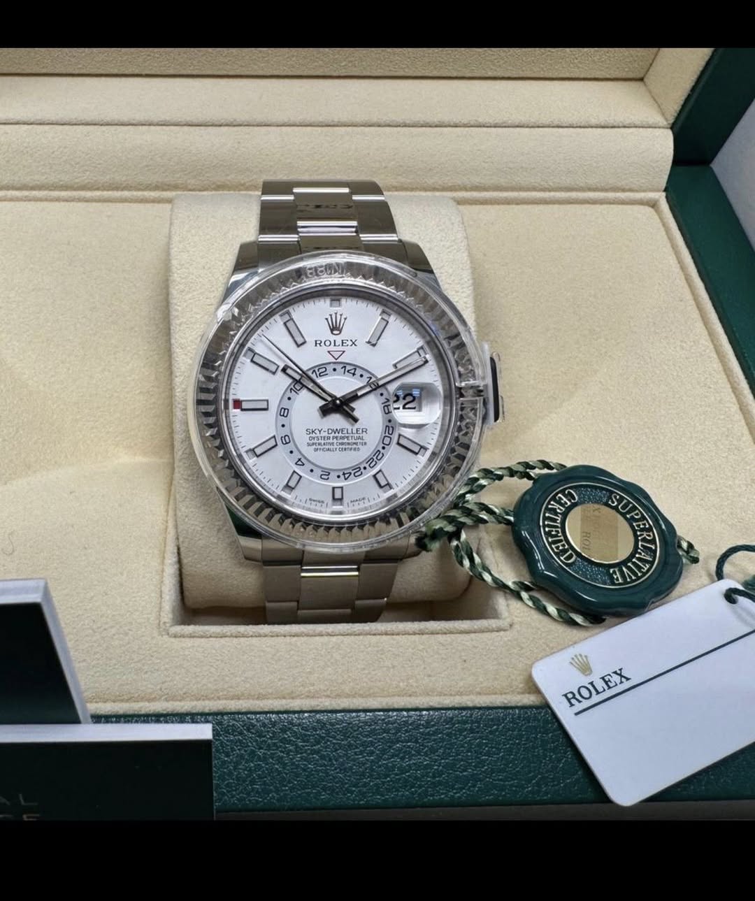 May be an image of wrist watch and text