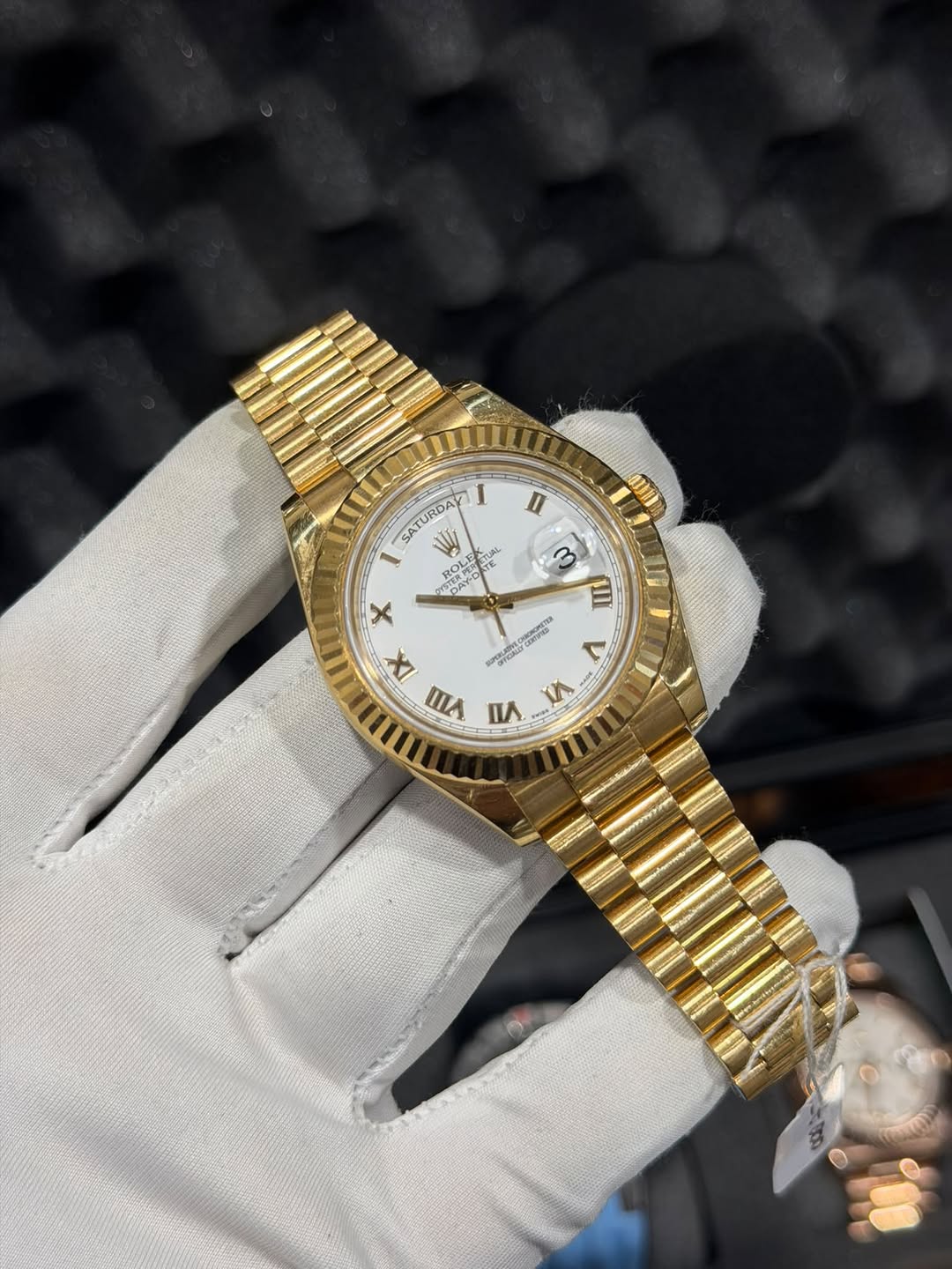 May be an image of wrist watch and text