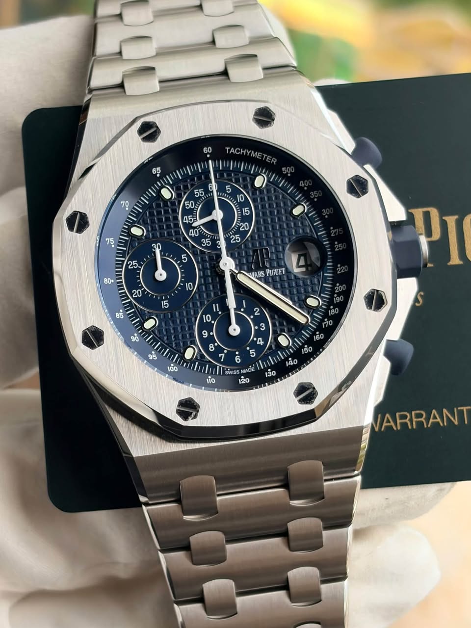 May be an image of wrist watch and text